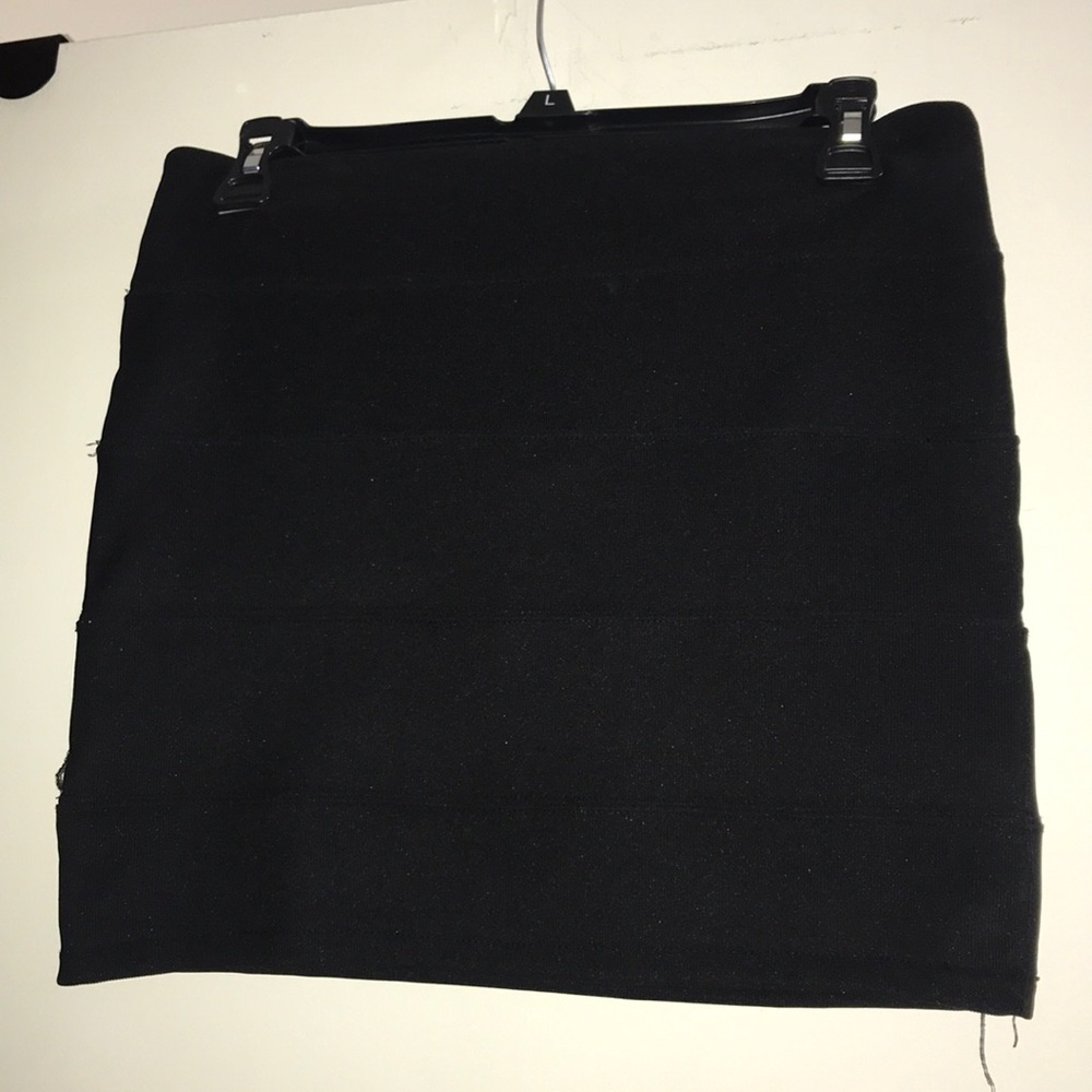 2 black pencil skirts